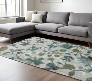 8' X 11' Teal Blue Machine Woven Floral Indoor Area Rug