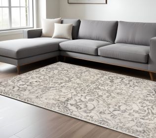 9' X 13' Ivory Machine Woven Distressed Floral Vines Indoor Area Rug