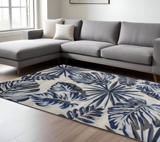 10' X 13' Grey Blue Machine Woven Tropical Leaves Indoor Area Rug