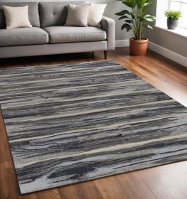 5' X 8' Grey Machine Woven Abstract Brushstroke Indoor Area Rug