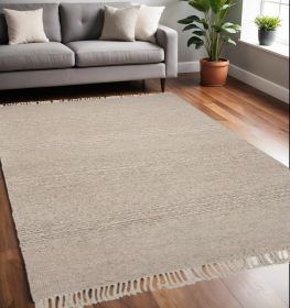 5' X 8' Natural Plain Wool Indoor Area Rug With Fringe