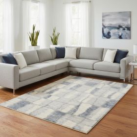 7' X 9' Ivory and Blue Area Rug