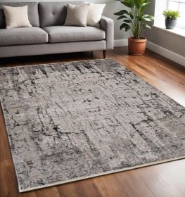 5' X 8' Ivory Grey Machine Woven Abstract Indoor Area Rug