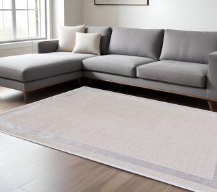 8' X 11' Ivory Silver Machine Woven Bordered Indoor Area Rug