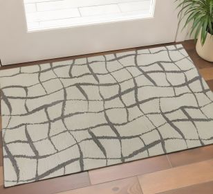3' X 5' Ivory Abstract Shag Area Rug