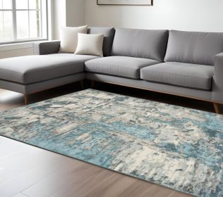 7' X 9' Ivory Or Teal Abstract Design Indoor Area Rug