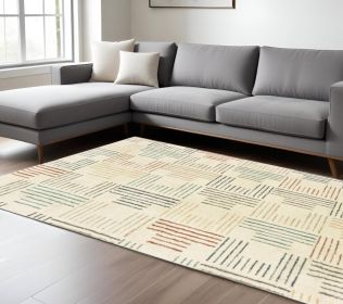 6' X 9' Ivory Multi Neutral Tone Scratch Indoor Area Rug