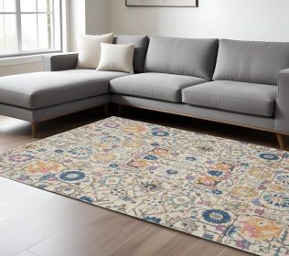 7' X 10' Orange And Ivory Floral Power Loom Area Rug
