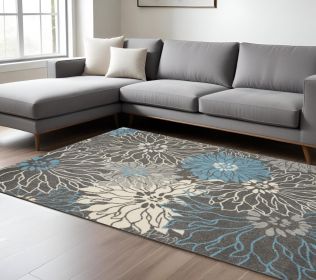 7' X 10' Blue And Gray Floral Power Loom Area Rug