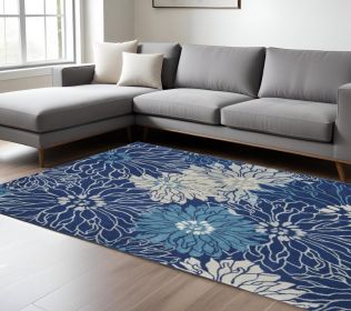 7' X 10' Blue And Ivory Floral Power Loom Area Rug
