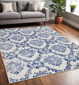 5' X 7' Blue And Ivory Floral Dhurrie Area Rug