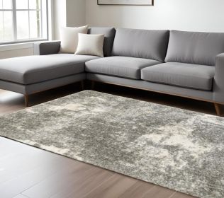 7' X 10' Gray And Ivory Distressed Abstract Area Rug