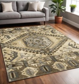 5' X 8' Tan And Gold Central Medallion Indoor Area Rug