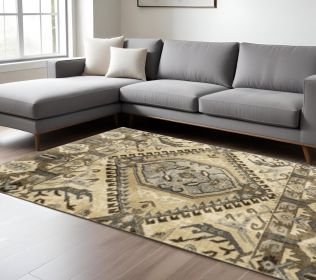 7' X 10' Tan And Gold Central Medallion Indoor Area Rug
