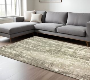 6' X 9' Gray And Ivory Abstract Splash Indoor Area Rug