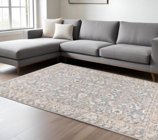 7' X 10' Blue Ivory Machine Woven Floral Oriental Indoor Area Rug