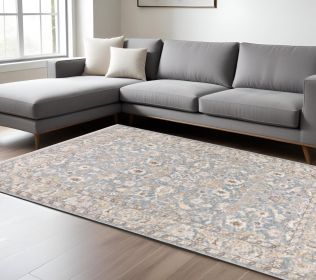 6' X 9' Blue Ivory Machine Woven Floral Oriental Indoor Area Rug