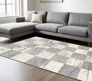 8' X 11' White And Gray Checkered Area Rug