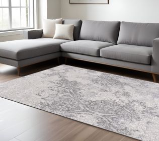 7' X 10' Cream And Gray Tinted Ogee Pattern Area Rug