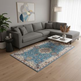 7' X 9' Blue and Ivory Oriental Power Loom Area Rug