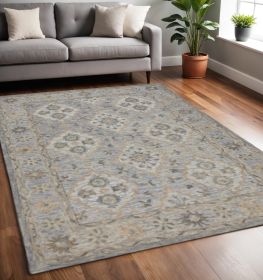 5' X 8' Blue and Tan Traditional Area Rug