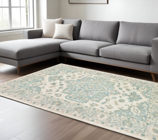 8' X 10' Turquoise and Cream Medallion Area Rug