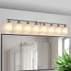 Modern 8-Light Brushed Nickel Finish Wall Sconce with Frosted Glass Lampshades. Bulbsnot included.