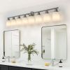 Modern 8-Light Brushed Nickel Finish Wall Sconce with Frosted Glass Lampshades. Bulbsnot included.