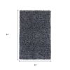 5' X 7' Black And White Shag Hand Woven Area Rug